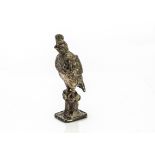 A George V silver model of a bird, import marks for London 1924, by SBL, the crested bird with