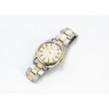 A c1980s Tudor Prince Oysterdate Rotor Self Winding stainless steel and gilt gentleman's wristwatch,