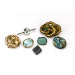 Seven gem set brooches, including two Victorian examples, an Astra high fired pebble brooch, a
