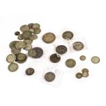 A collection of British silver coins, including a William III 1696 crown, worn-F, a George III