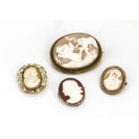 Four Victorian cameos, including three shell examples carved with classical scenes and a cameo glass