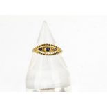 An Edwardian sapphire and diamond 18ct gold dress ring, in yellow gold with Chester hallmark to