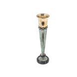 A modern mixed metal sculptural vase, marble base with tapered bronze stem supporting a silver