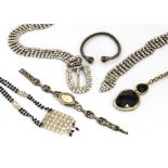 A quantity of costume jewellery, including a paste set belt, a pair of parrot wooden painted drop