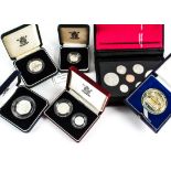 A collection of Royal Mint and other silver proof and other coins, including a 1994 three coin