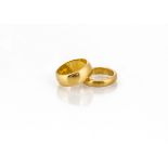 Two 22ct gold wedding bands, ring size K 1/2 and M, 18g