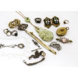 A small quantity of miscellaneous jewellery, including a white metal skeleton charm pendant, a