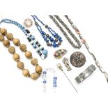 A large quantity of costume jewellery, including various Scottish jewellery, paste set brooches,