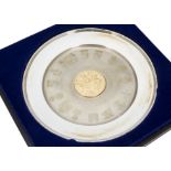 A 1970s silver commemorative plate, the 1977 charger celebrating the College of Arms, in