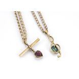 Two flattened curb linked gold chains, including one with T bar and amethyst heart shaped drop and