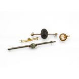 A 9ct gold and scarab bar brooch, a bar brooch set with posey ring setting, a yellow metal and shell