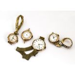 Four early to mid 20th century 9ct gold cased ladies wristwatches, three on gold plated straps