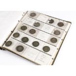 A collection of British silver coins, in a folder and including an Elizabeth I 1561 groat, a William
