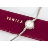 A 1960s Vertex 18ct white gold and diamond lady's cocktail dress wristwatch, having diamond set