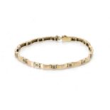 A continental yellow metal diamond set line bracelet, the eight cut diamonds in square links