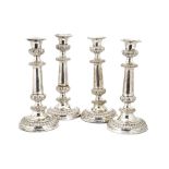 A set of four Victorian Sheffield plate candlesticks