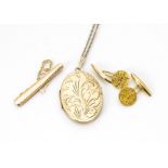 A pair of yellow metal cufflinks, decorated with the Maltese cross, a yellow metal tie slide and a