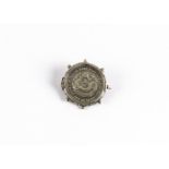 A late 19th century Chinese Kwangtung Province 20 cent coin mounted in a silver brooch