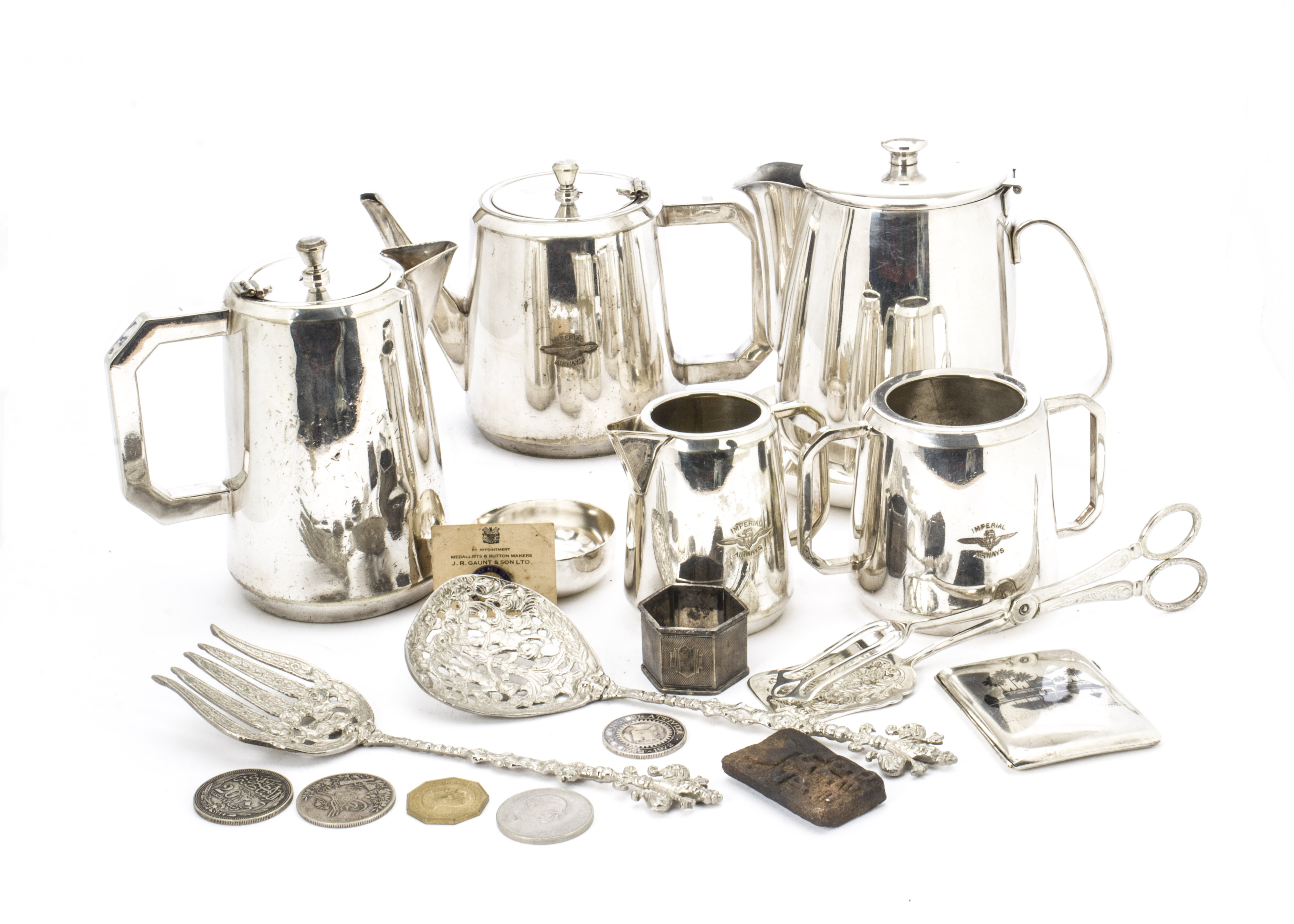 A collection of silver and silver plated items, including an Egyptian silver and niello cigarette