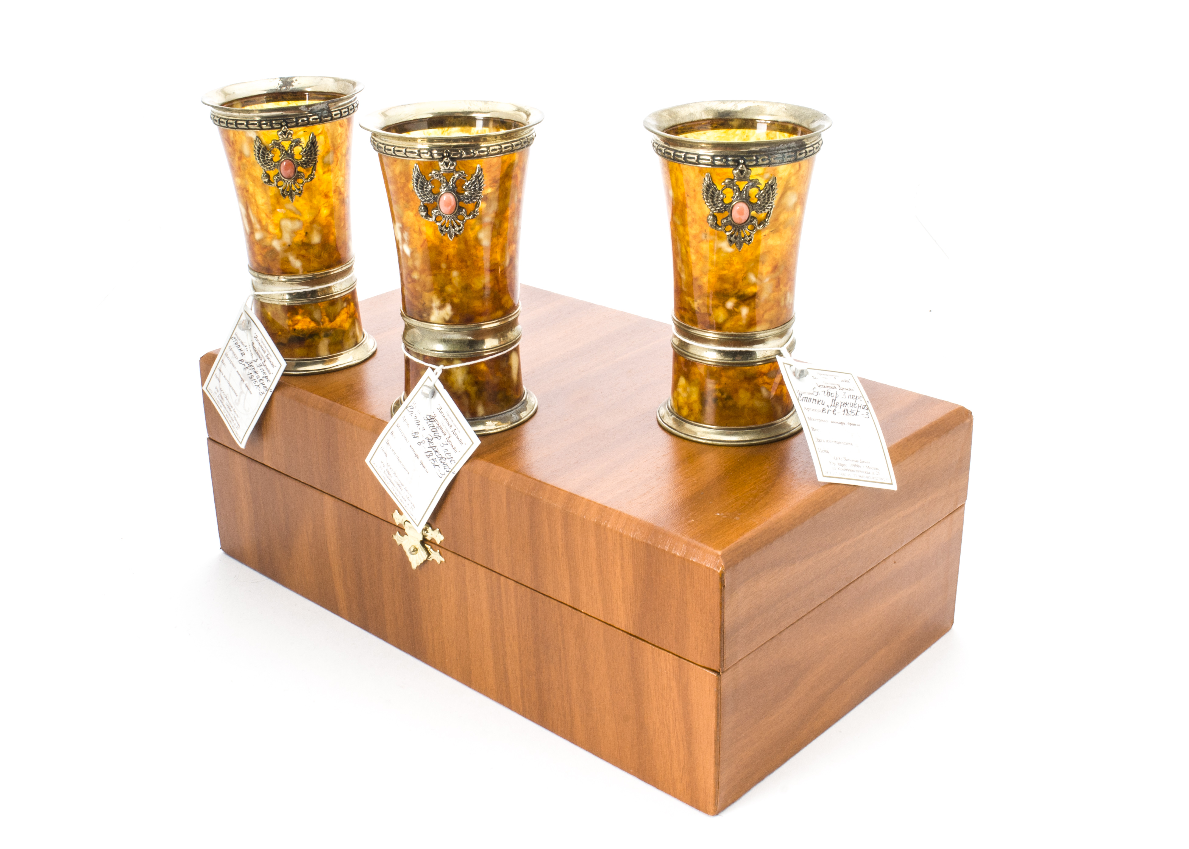 A set of three modern Russian beakers, in box, probably from the Amber Palace, each with gilt mounts