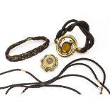 A collection of plaited Victorian hair mourning jewellery, including an interwoven bracelet