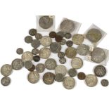 A small collection of American coins, including four dollars, 1878, 1879, 1898 and 1900, along