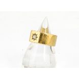 An 18ct gold gentleman's diamond set signet ring, the single old cut stone in gypsy setting