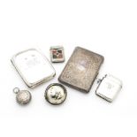 Four Victorian and later collectable items of silver, including a purse, a cigarette case, a vesta