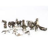 A collection of silver and silver plated small animals and insects, including a snail, lizard,