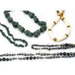 A quantity of hardstone necklaces, including haematite, lapis lazuli, amethyst, malachite,