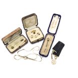 Three gold stick pins, a 9ct gold stud set, 9ct gold bar and masonic fob, 15g, three items cased