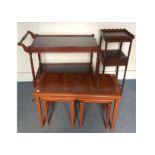A contemporary mahogany two-tiered trolley with inlay, a slide to top and a drawer to under tier,