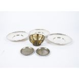 Three Elkington silver plated dishes, together with a Middle Eastern bowl, the glass encased in