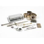 Seven 20th Century silver napkin rings, by various makers, two silver plated cigarette cases and