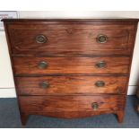 A mid 19th Century mahogany secretaire chest of drawers, three graduated drawers below fitted bureau