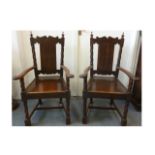 A pair of antique continental rosewood armchairs, having rope twist columns, with panelled seat,