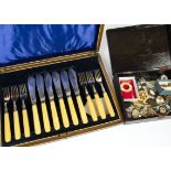 A 20th Century canteen of silver plated cutlery, six fish knives and forks, in a fitted wooden