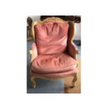A 1950's armchair in the Louis XV style, wooden frame with pink upholstery, 92 cm x 70 cm x 60 cm