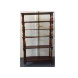 A 19th Century mahogany six-tier what not, comprising of six graduated shelves with turned supports,
