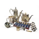 A large quantity of silver plate, including a vanity set, plated hip flask, plated flatware,