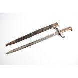 An 1871 Pattern sawback bayonet with matching serial numbers, both the bayonet cross guard and the