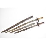 A French Chesspot bayonet, serial 14781, with metal scabbard, serial 66556, together with a French