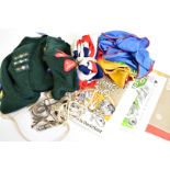 An assortment of Scouting items, including a uniform, comprising of two jumpers, a shirt, a cap