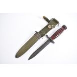 A Dutch M4 bayonet, with US M8A scabbard and frog