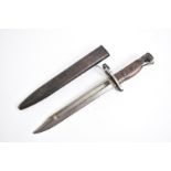 A Jungle Carbine No.5 MkI bayonet by Radcliffe, complete with metal scabbard