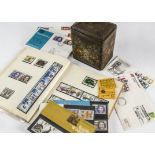 A collection of stamps and First Day Covers, some pre- and post decimal mint, a schoolboy album with