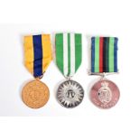 Three Irish Police Medals, comprising a Royal Ulster Long Service medal awarded to Constable E.J