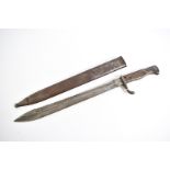 A 98/05 Butchers Sawback bayonet, complete with steel scabbard, having markings to the entrance to