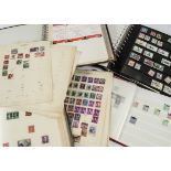 A collection of stamps and other items, in two boxes, including two Simplex albums, other albums and
