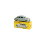 A French Dinky Toys 24x Ford Vedette, pale grey body and convex hubs, in original box, E, box G,